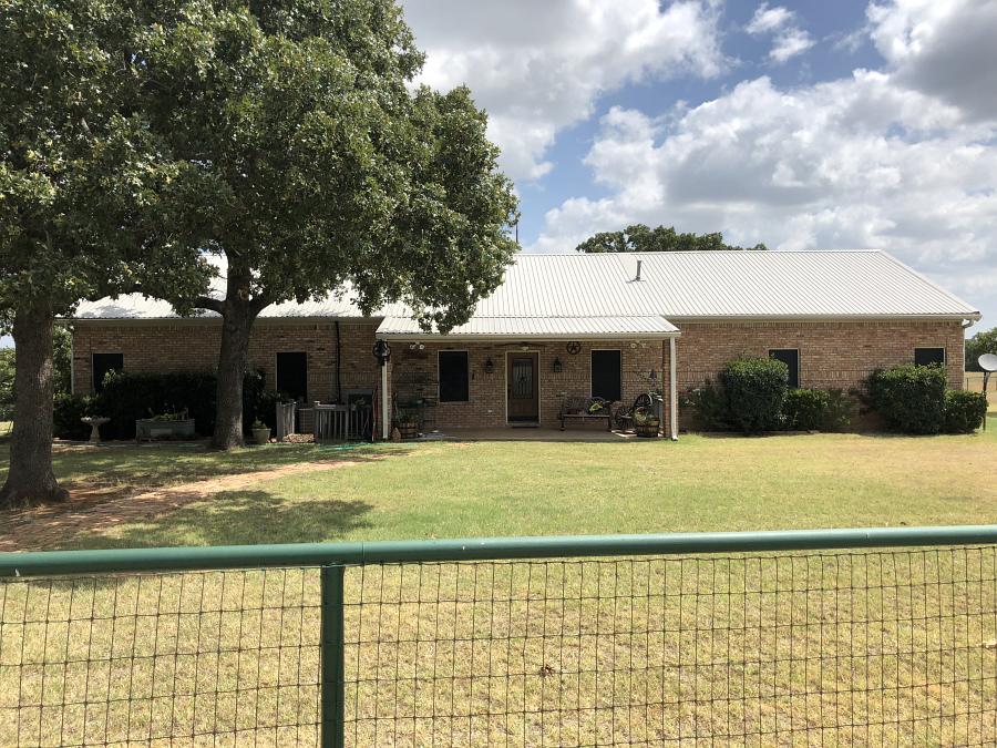 Solar screens installed on a home by Weatherford Glass